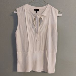 White sleeveless sweater blouse